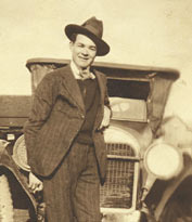 chap with his car in the early 1930s