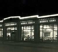 Stewart & Ardern's Morris car dealership at night