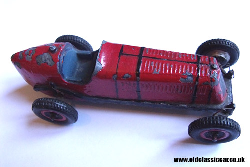 Side view of the Scamold toy racing car