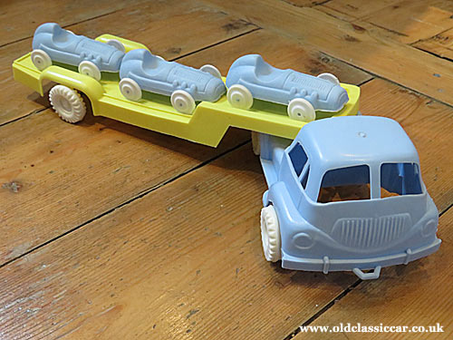 Plastic lorry and racing cars
