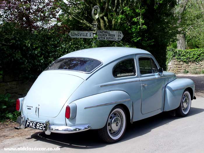 The Volvo PV544, and an ancient fingerpost road sign