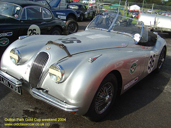 Classic Jaguar XK120 roadster car on this vintage rally