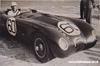 Stirling Moss in Jaguar C-Type