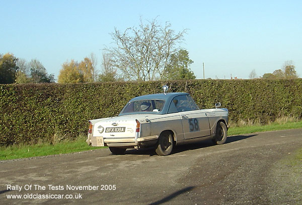 Classic Triumph Herald Coupe car on this vintage rally