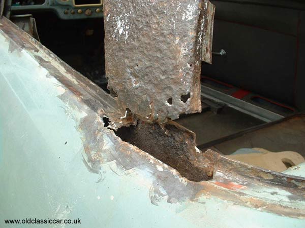 Plenty of rotten metal in the rear screen pillar