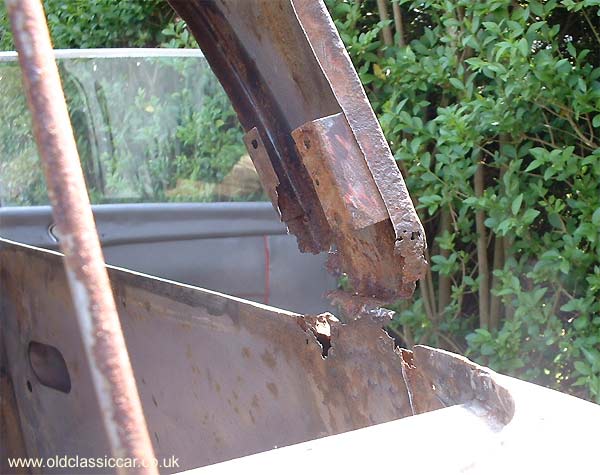 The extent of rot in the rear screen pillars is very evident here