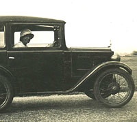 A lady in her Austin 7