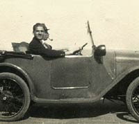 Two men sat in the Austin Chummy