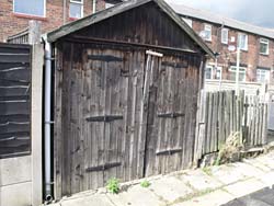 Old wooden garage where the Austin lay