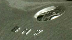 BMW and Elva badges