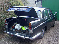 Unloading the Austin's boot