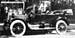 Chauffeur photographed with his car