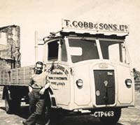 Bomb damaged buildings and a Dennis lorry