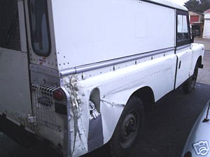 Dent in the rear side panel