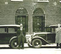 A Model A joined by a later Model B Ford