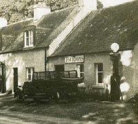 A roadside petrol station of the 1920s