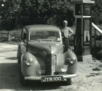 1948 Hillman at a petrol station