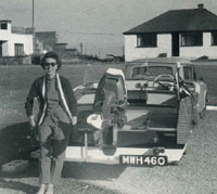 Hillman Husky towing a motor boat