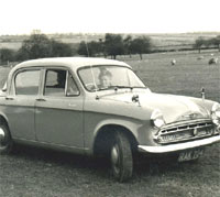 The Hillman parked in a field