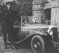 A Hillman with a police officer