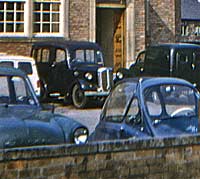 A Bradford and other classics outside a hotel
