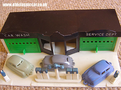 Plastic garage and cars