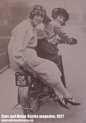 Two ladies on a motorcycle