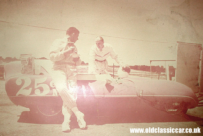 A Lotus 11 racing car with driver
