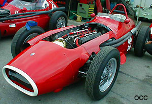 Bonnet off the canted over straight 6 engine can be seen