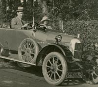 People sat in a 1922 or 1923 Cowley four-seater tourer