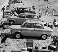 NSU Prinz car parked on a beach