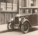 1930s car parked at the road side