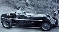 Dennis Poore in the Alfa