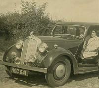 Two ladies and a P2 Rover car