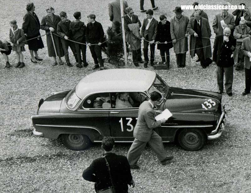 A Simca Aronde 90A Grand Large competes in a rally.