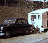 A Standard Vanguard car tows a caravan