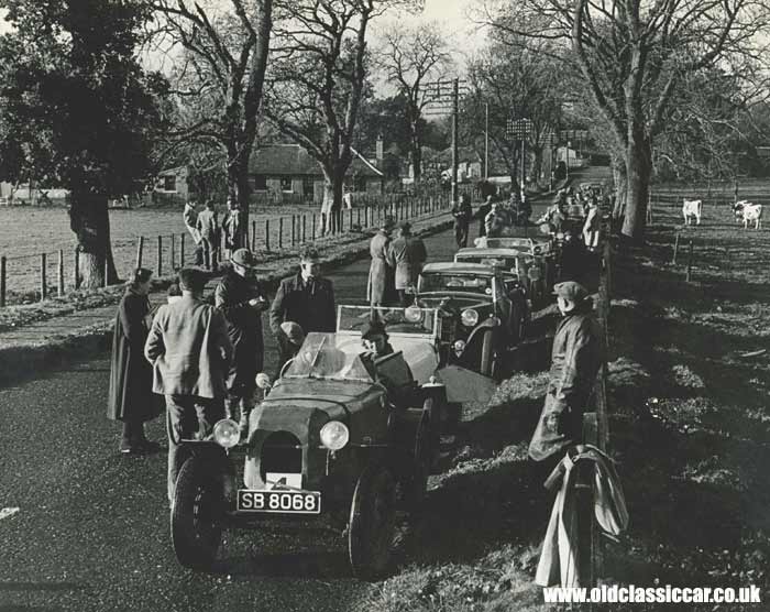 Line-up of old trials cars