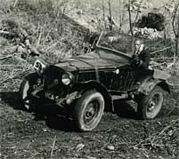 A car competes in a post-war trial