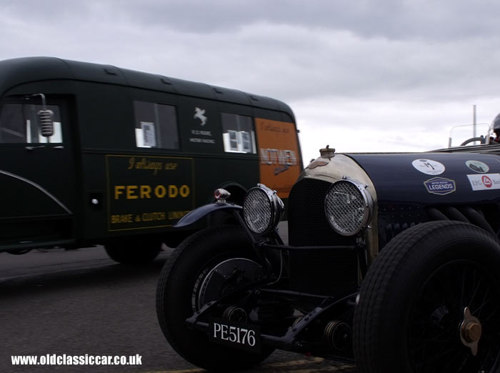 Bentley drives past the Dodge