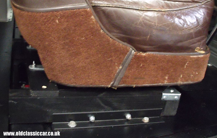 Installing the passenger seat in the Dodge truck