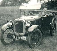 Man sat in a 1929 Austin 7 Chummy