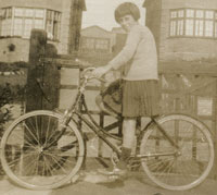 A girl on her 1920s bike