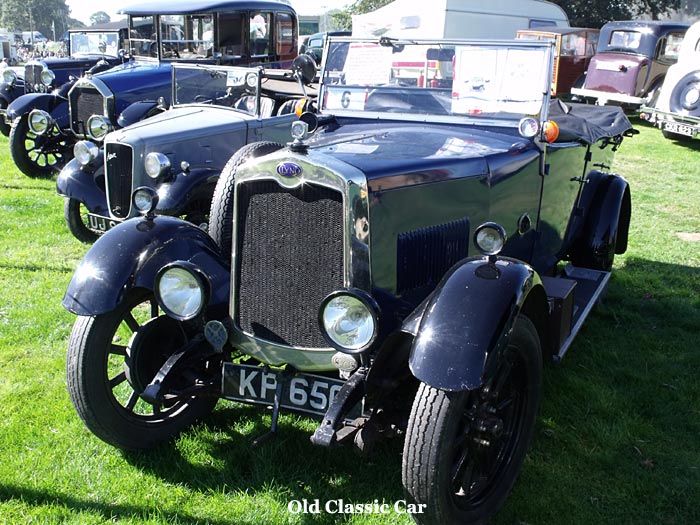 Vintage cars on display at a show