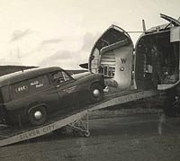 Commer Express delivery van being loaded into the aircraft