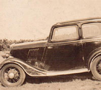 Side view of a Model Y Tudor