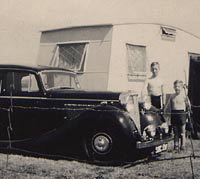 Jaguar 1.5 SE model with an old caravan