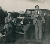 Three people and the vintage Morris