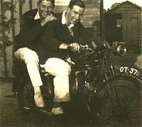 Two riders on a 1926 or 1927 motorbike