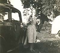 A Morris 8 car in a camping field