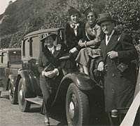 Ladies sat on a car in Bournemouth, 1938